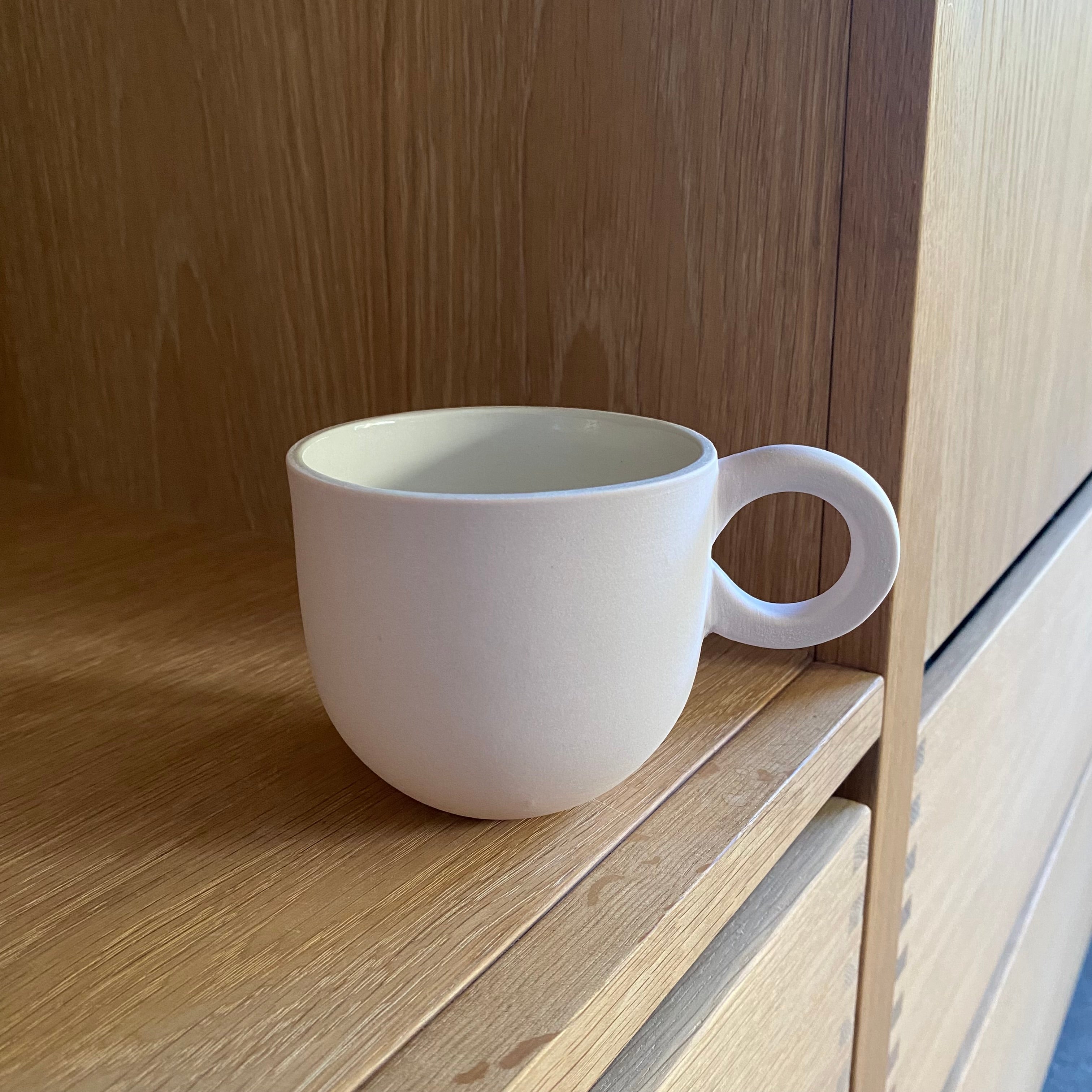 Chubby kaffekop i sart lyserød håndlavet keramik