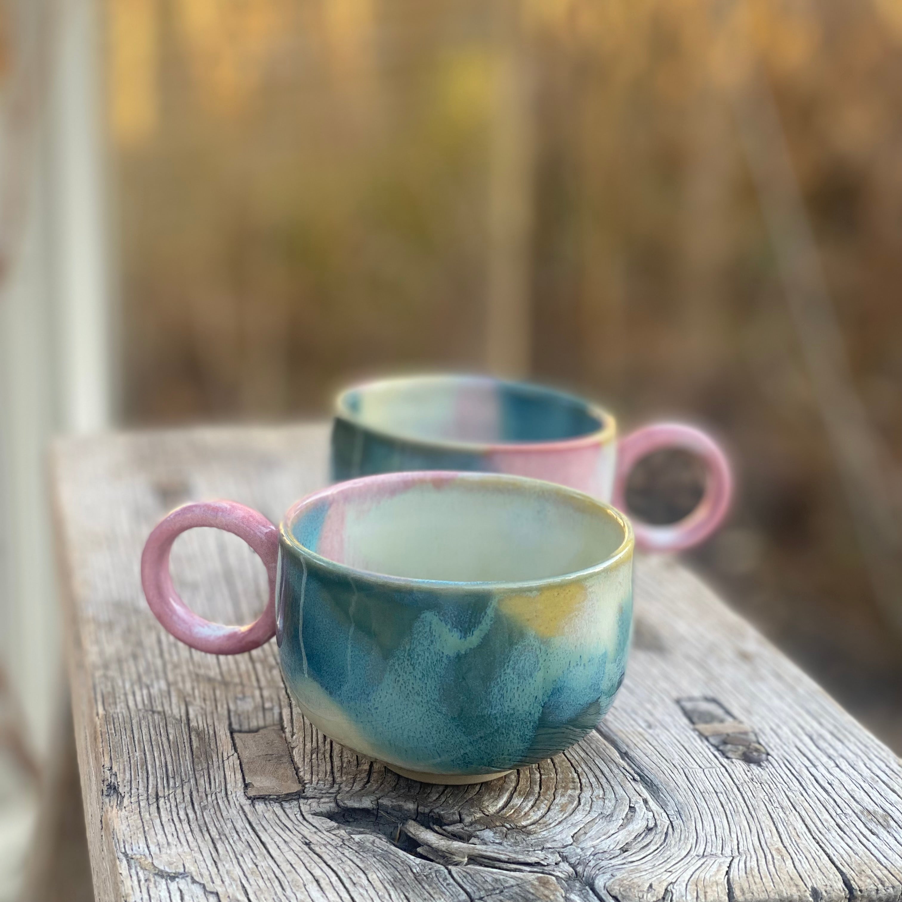 farverig kop med hank nami sol i smukke farver