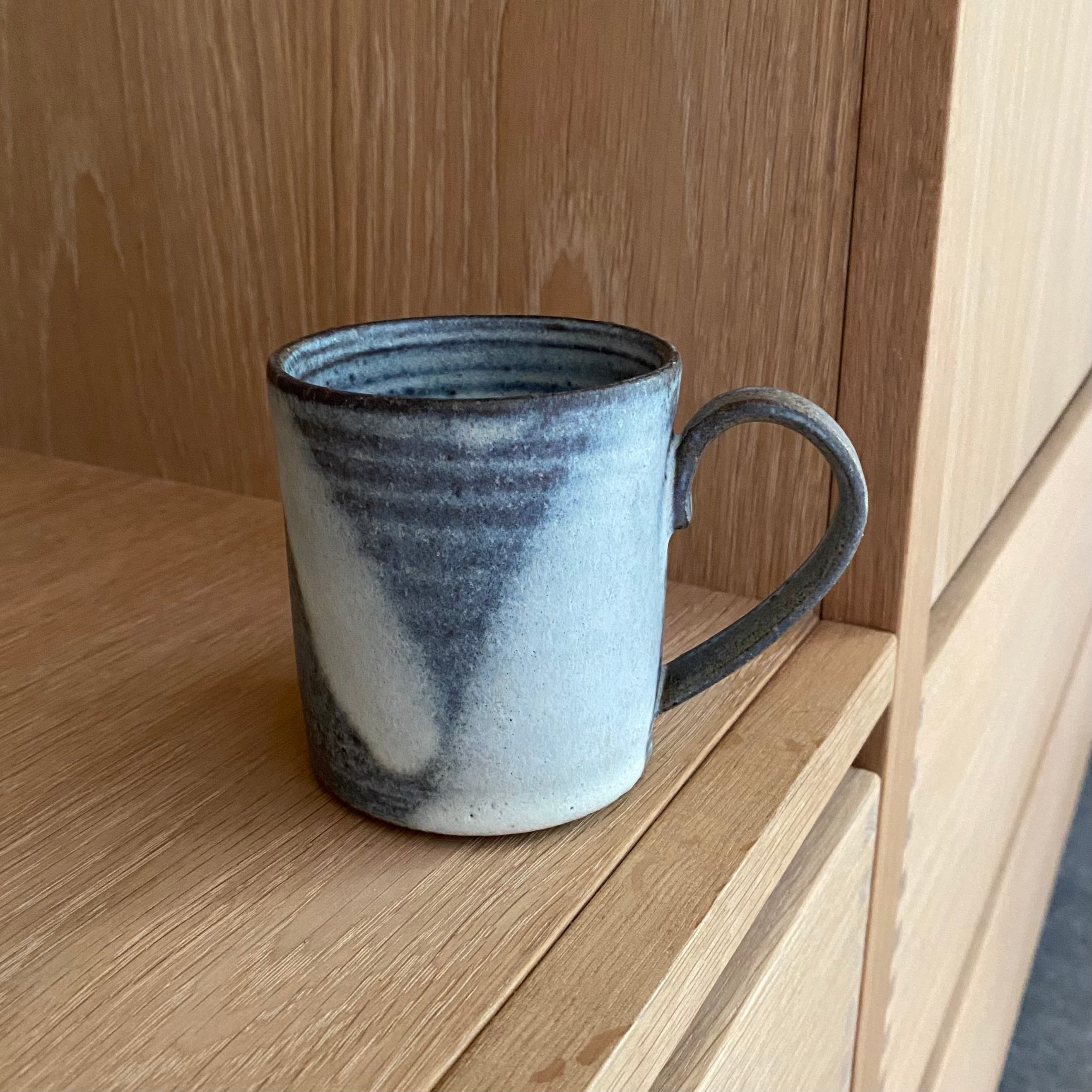 handmade mug in blue by blacksmith ceramics in denmark