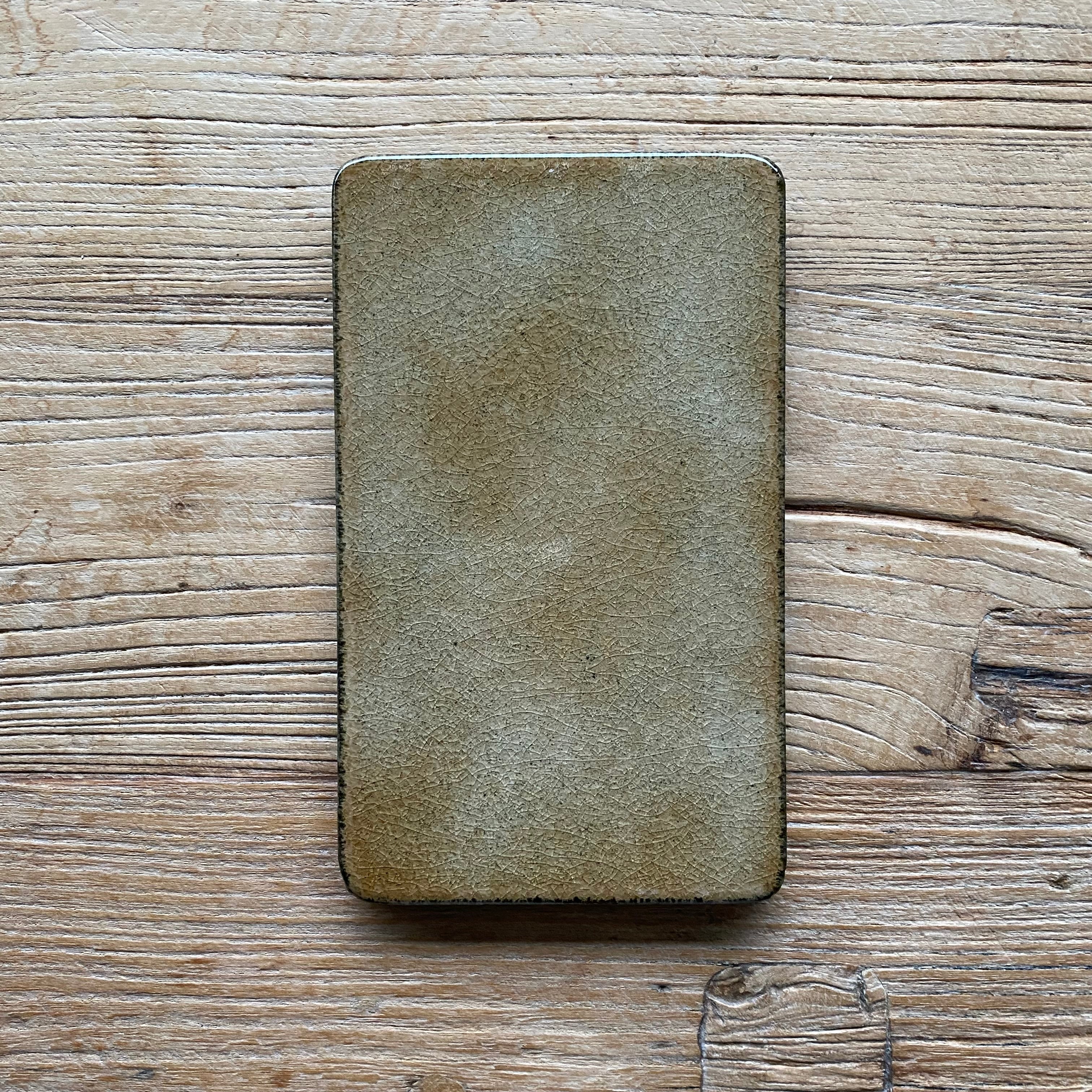 Håndlavet lavastensbræt i gyldenbrun lavasten 12 x 20 cm