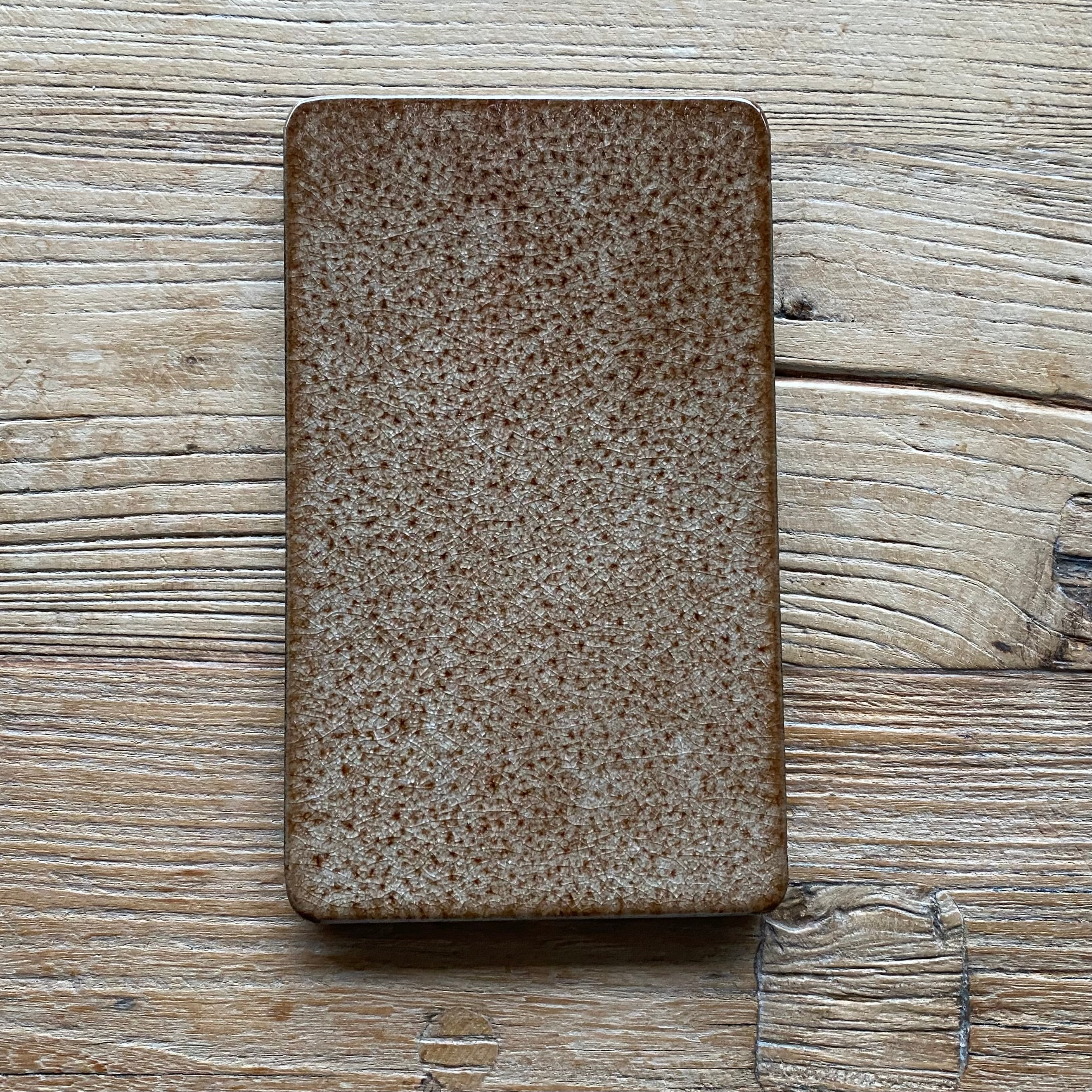 Håndlavet lavastensbræt i unika brun lavasten 12 x 20 cm